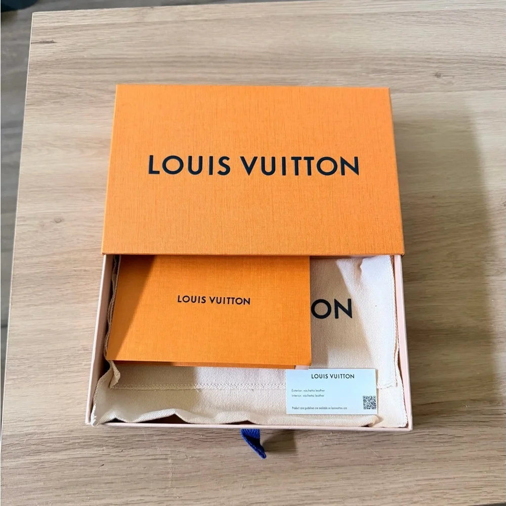 Louis Vuitton Gray Monogram-Embossed Wallet